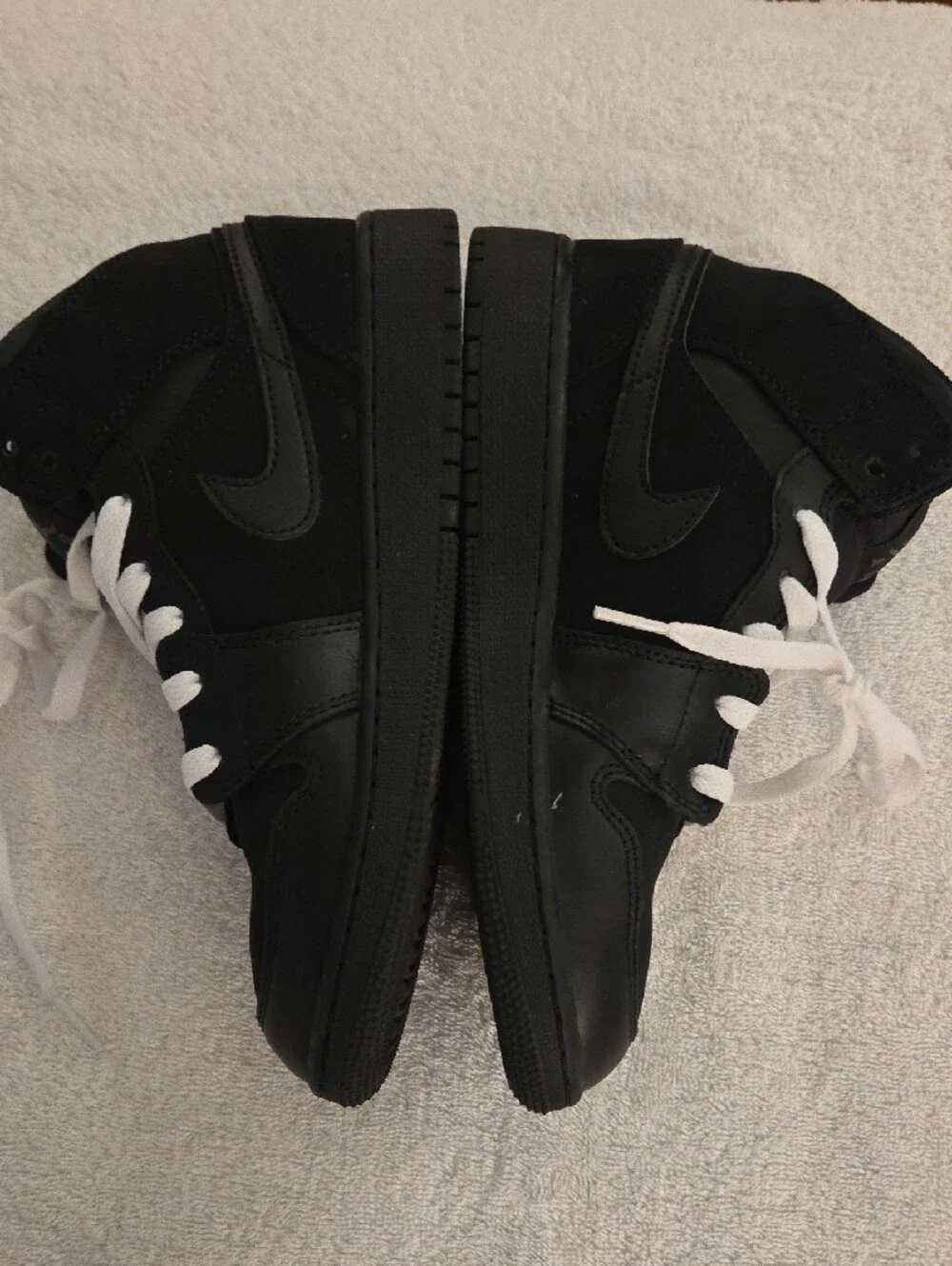 Jordan Kids Black and White High-Top Sneakers